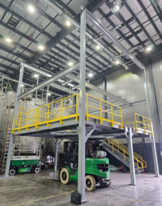 access platform and stairs inside an industrial facility