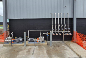 outdoor piping skid fitted to the outside of an industrial facility